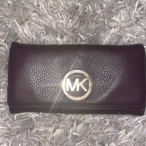 Pretty Plum color Michael Kors wallet